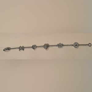 Slightly used but in great condition juicy couture 5 charm bracelet.